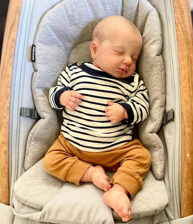 Śpiąca lalka reborn chłopiec z malowanymi włosami