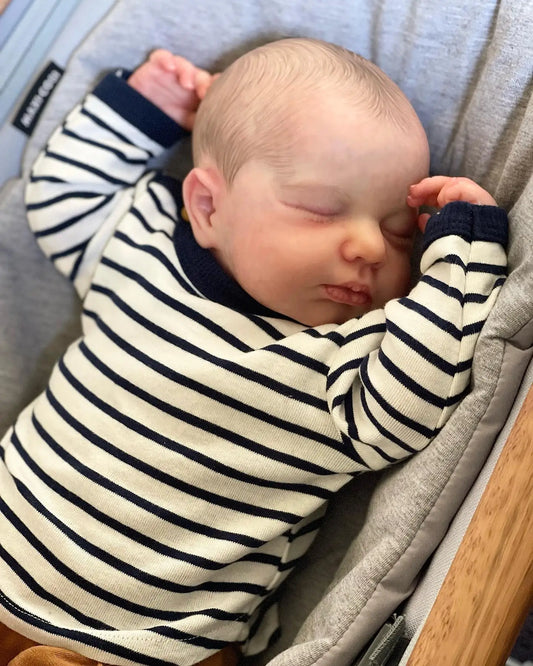 Śpiąca lalka reborn chłopiec z malowanymi włosami